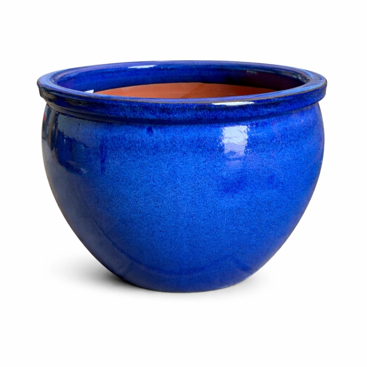 Niebieska ceramiczna doniczka na białym tle.png